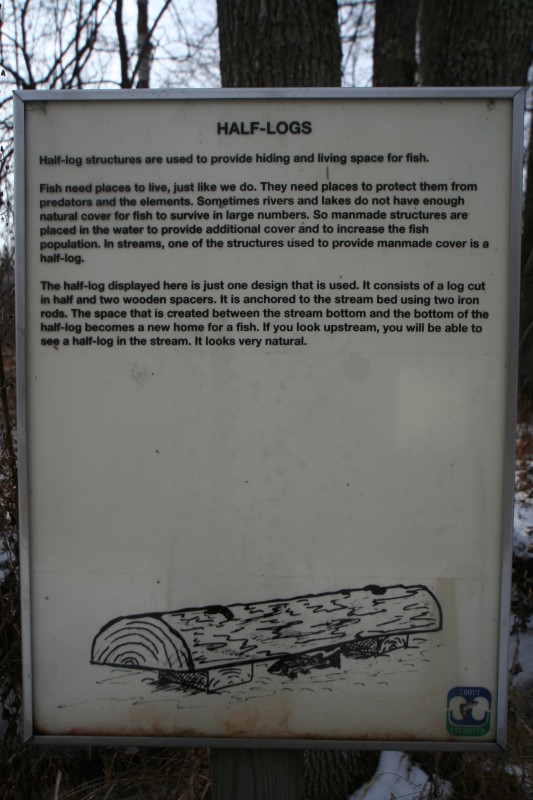 Half-log sign with narrative