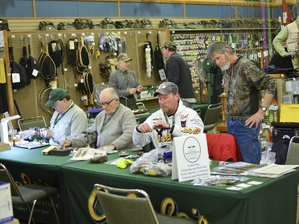 Cabela's fly tying crew getting set up