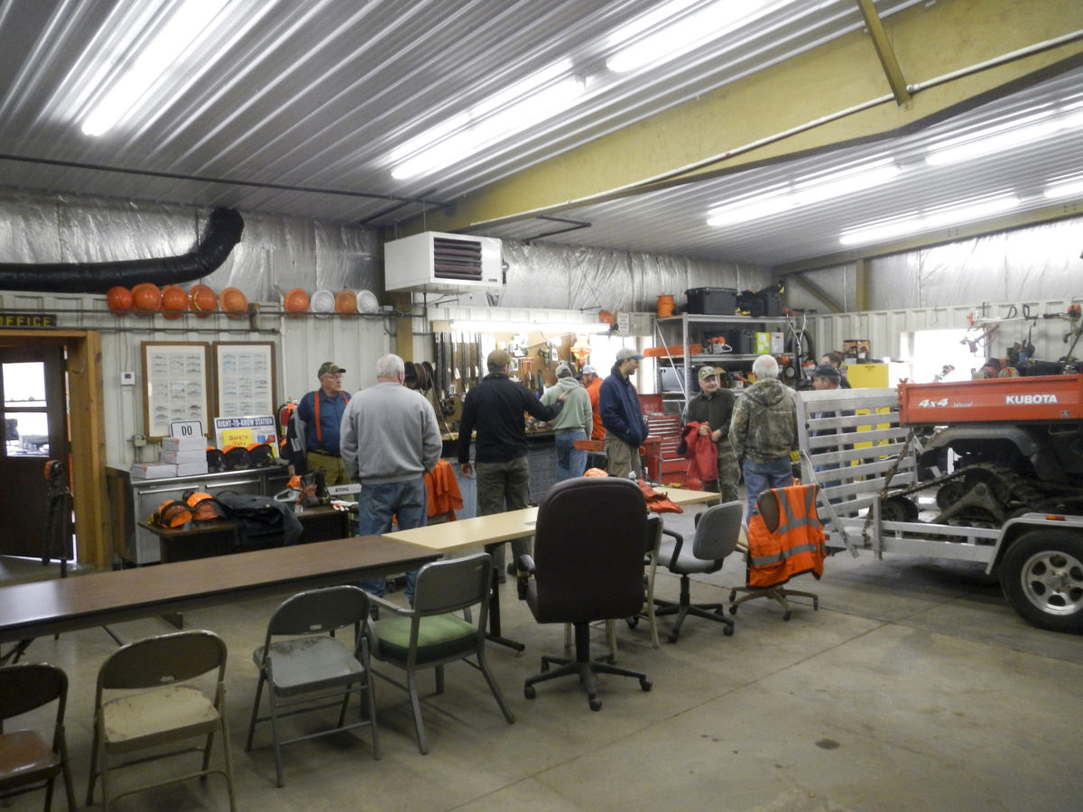 Chainsaw students gathering at work center